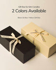Two color variations of the gift box for mini wellness candles, offering elegant packaging choices for gifting