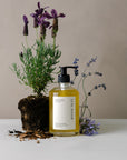 Organic body wash in glass pump bottle with lavender.