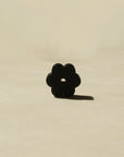 front view of black coated flower incense holder
