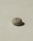 bottom view of mini grey pebble incense holder