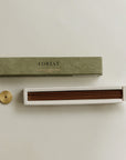 incense sticks on the built-in insert and brass holder on the side
