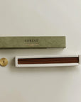 incense sticks on the built-in insert and brass holder on the side