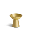 Modern conical brass incense holder with a smooth, polished surface