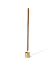 cinnamon incense with a cylinder incense holder with a brass