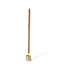 cinnamon incense with a cylinder incense holder with a brass