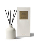 Deep Breath Reed Diffuser with reed sticks, accompanied by its elegant package box