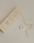 Japanese frankincense incense set with handmade ceramic flower-shaped holder and washi-style packaging