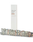 organic white sage smudge stick bundle with white packaging box labeled cleansing and purifying