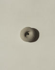 top view of light grey mini pebble incense holder