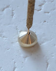 an incense stick with a medium waterdrop incense holder made of brass