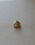 an incense holder with a brass medium waterdrop