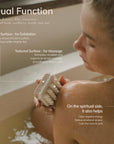 Woman in a bathtub with a bath pouf, text about dual function of the bar soap