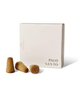 Box of 20 Palo Santo incense cones with three natural brown cones displayed in front, designed for spiritual cleansing and aromatherapy