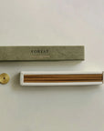 incense sticks on the built-in insert and brass holder on the side