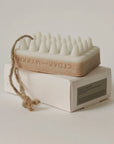 Bar of soap with a rope and packaging