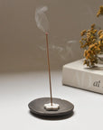 burning aged sandalwood incense with incense holders made of ceramic