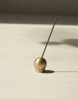 brass incense holder with a shape of sphere