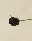top view of black flower brass incense holder