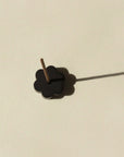 top view of black flower brass incense holder