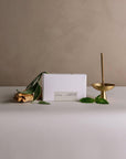 White Sage incense stick with Burning Ritual box, brass holder, fresh sage leaves, and Palo Santo wood
