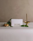 White Sage incense stick with Burning Ritual box, brass holder, fresh sage leaves, and Palo Santo wood