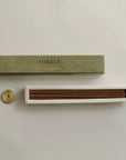 white sage incense sticks on the insert and brass incense holder on the side