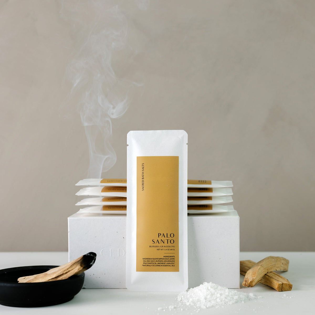 Cedar and Myrrh Palo Santo Sacred Bath Salts displayed with natural Palo Santo wood, mineral bath salts, and gently rising incense smoke in a minimalist wellness setting.











Is this conversation helpful so far?