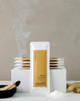 Cedar and Myrrh Palo Santo Sacred Bath Salts displayed with natural Palo Santo wood, mineral bath salts, and gently rising incense smoke in a minimalist wellness setting.











Is this conversation helpful so far?