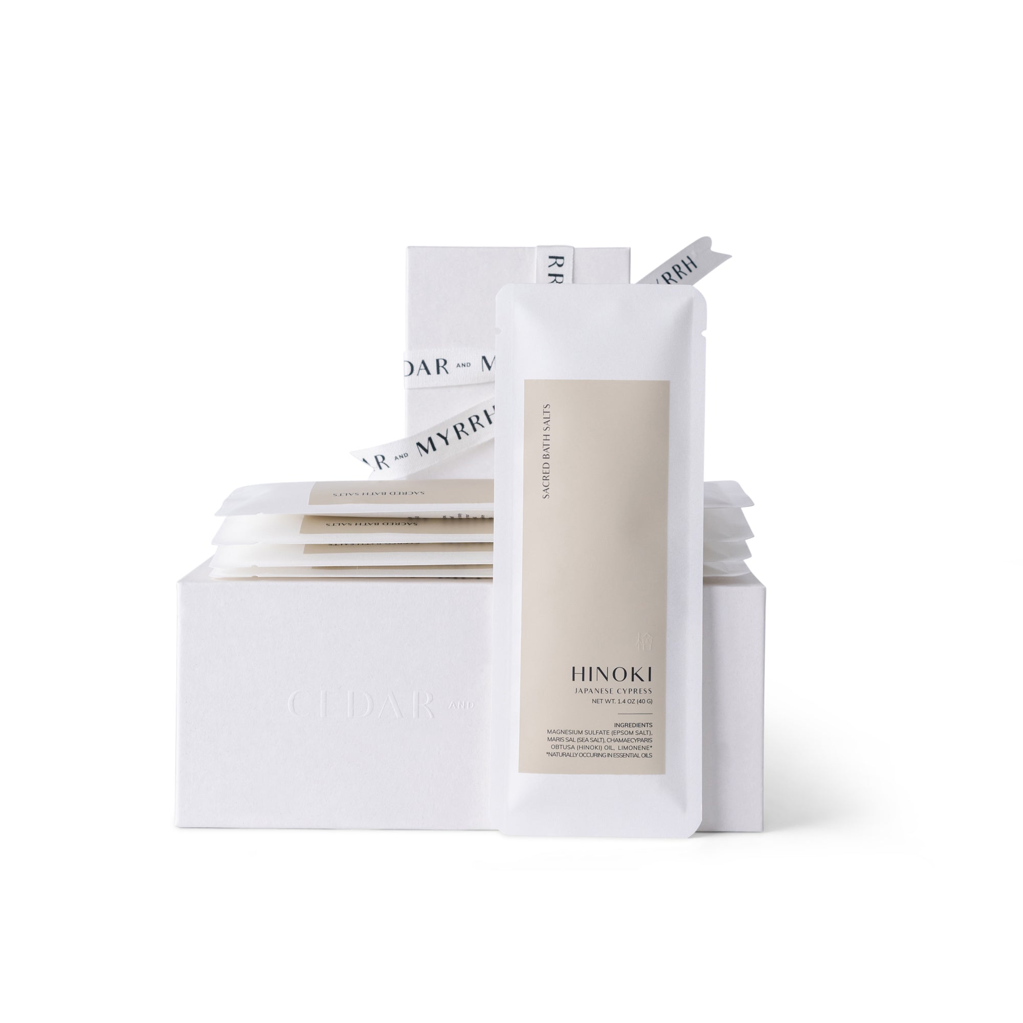 Packaging of Hinoki organic products on a white background