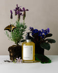 calming organic aromatherapy body wash surrounded by fresh botanicals, highlighting mindful cleansing rituals.