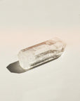 rear view of clear quartz crystal with light reflection