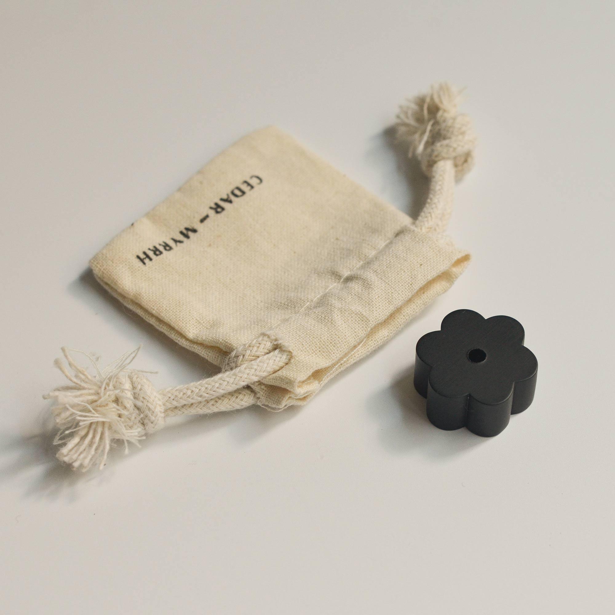 flower black coated incense holder with pouch