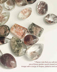 several patterns, colors and sizes of garden quartz crystals