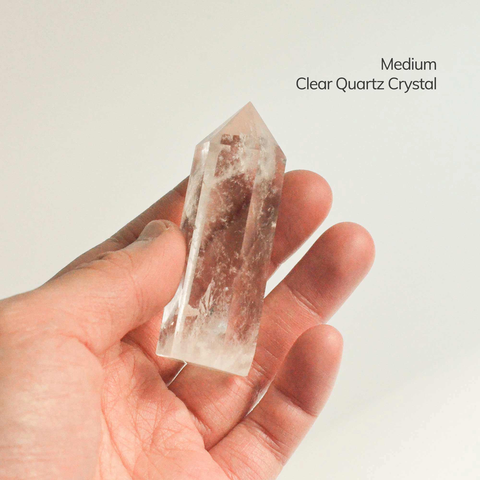 holding medium clear quartz crystal