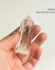 holding medium clear quartz crystal
