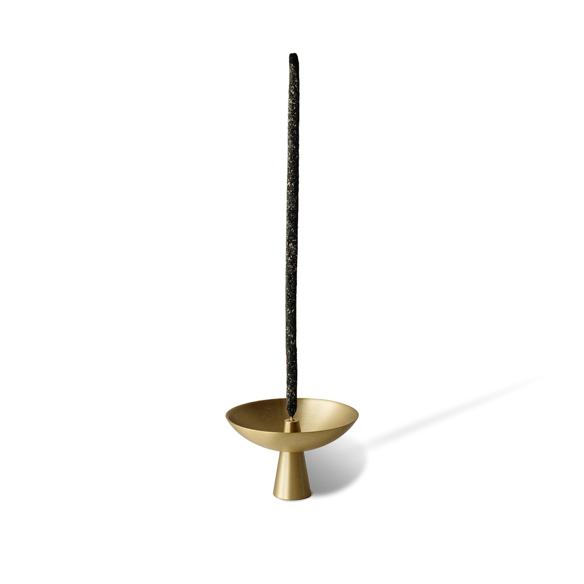 copal incense and an incense holder with ash catcher made of brass