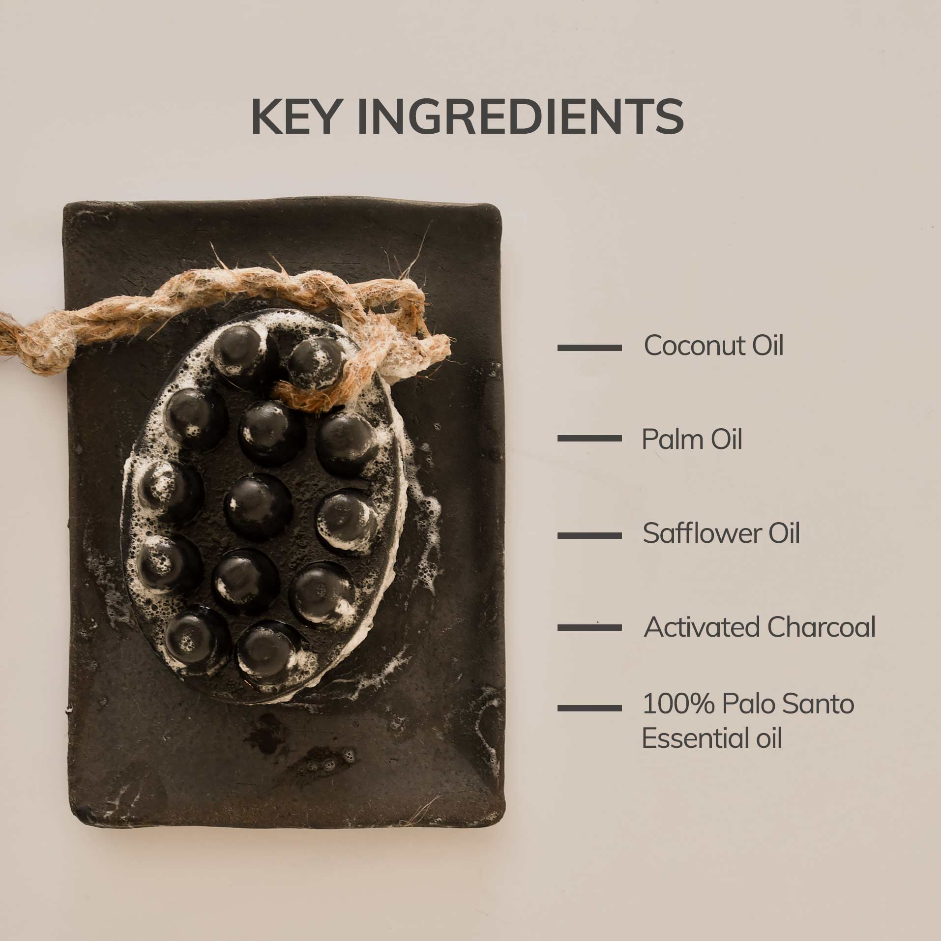 key ingredients of palo santo charcoal bar soap such as coconut oil, palm oil, safflower oil, activated charcoal, palo santo essential oil