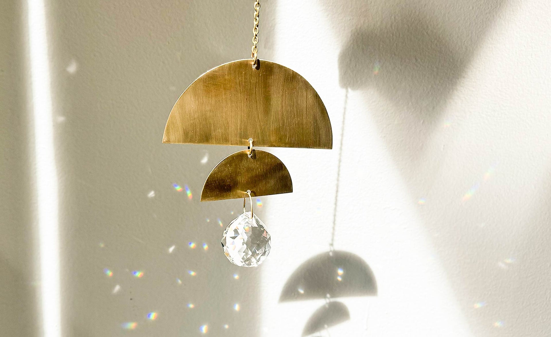 Surya Cascade Floral Engraved Brass Suncatcher