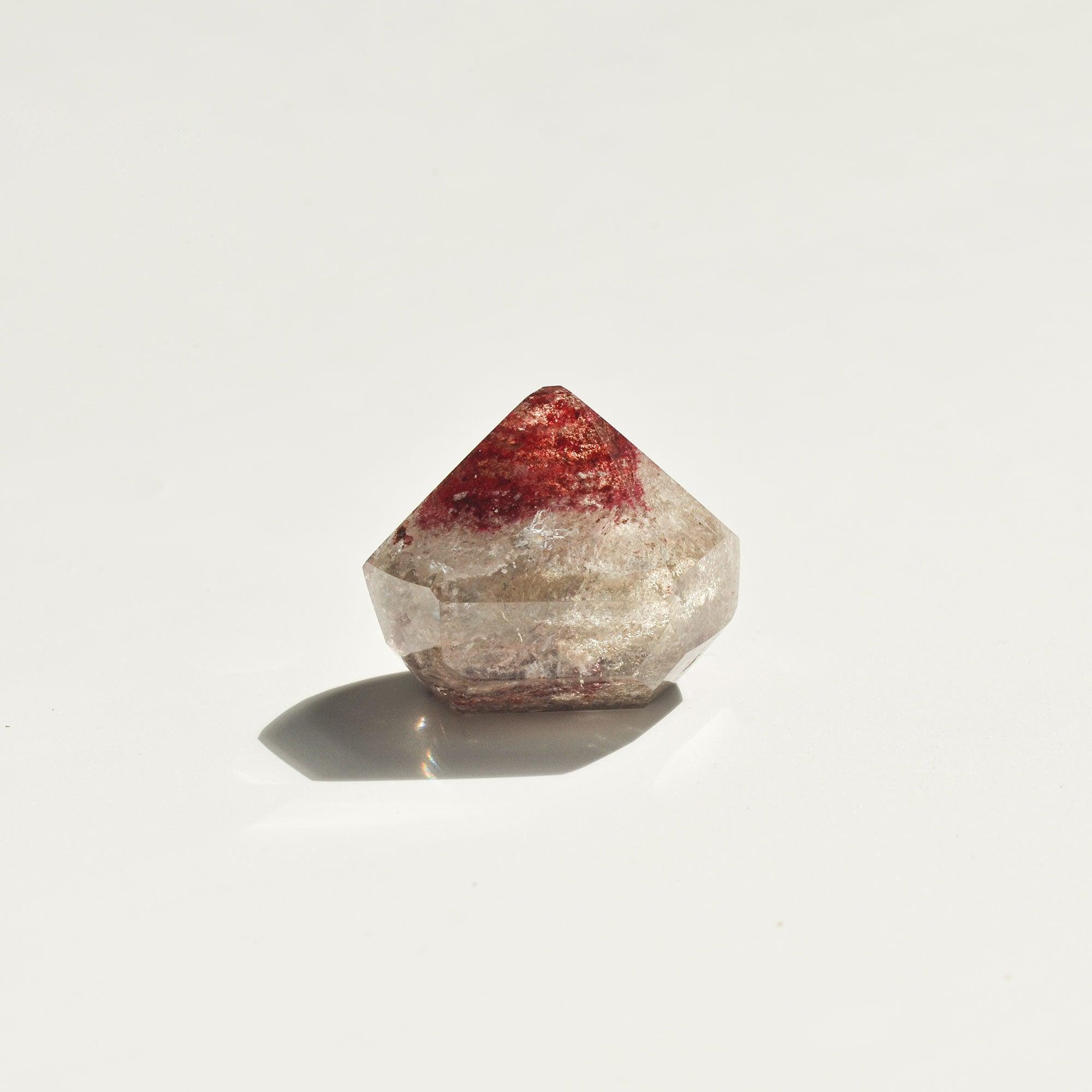 transparent and red diamond shaped phantom quartz