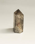 The side view of the phantom quartz crystal tower in brown hexagonal shape