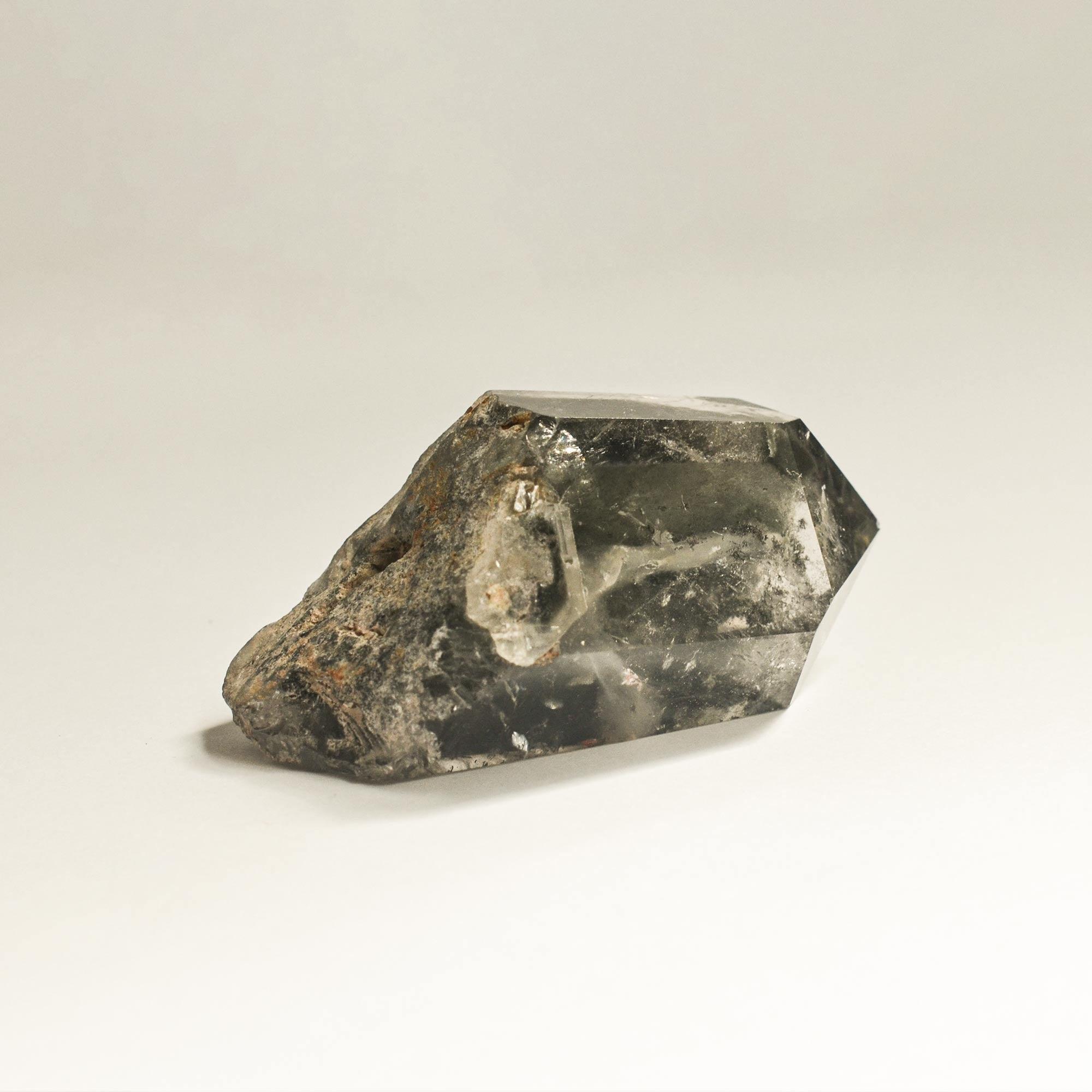 large crystal of hematite phantom quartz with slanted look