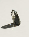 transparent hematite phantom quartz crystal tower