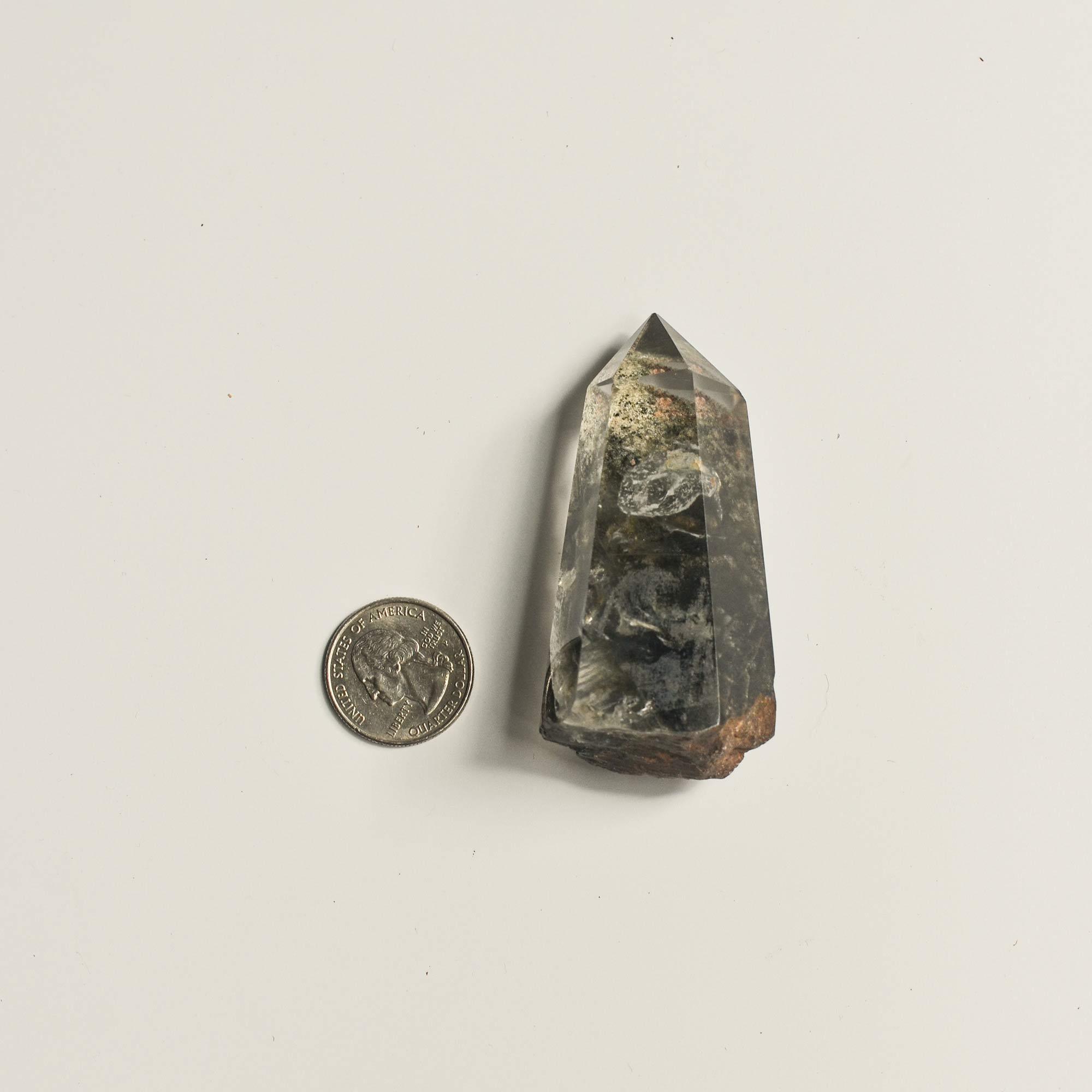 coin and transparent hematite phantom quartz 