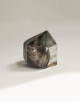 side version of short hematite phantom quartz crystal