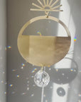 suncatcher and crystal brass suncatcher with light reflections and rainbows