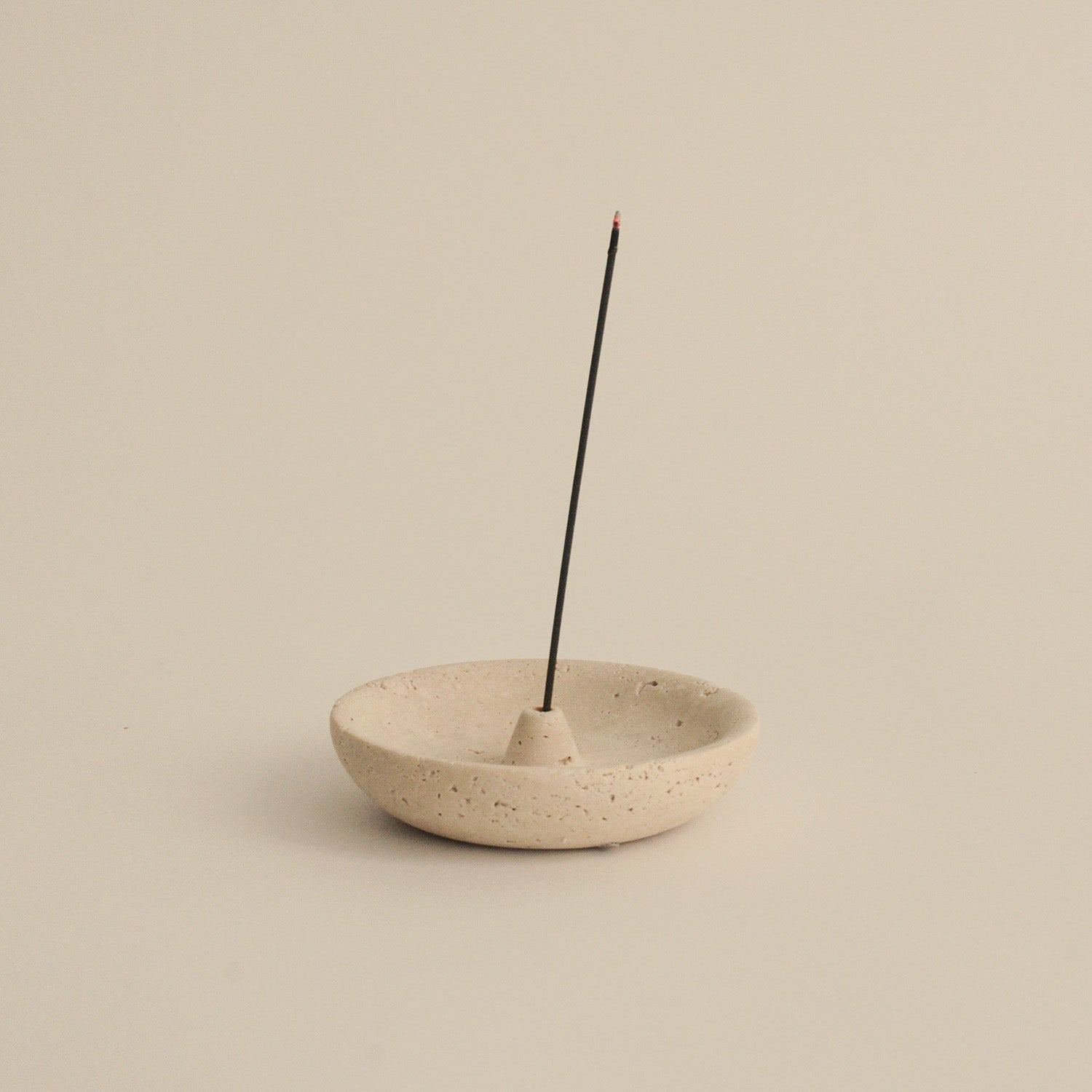 Incense holder crafted from travertine with Japanese incense