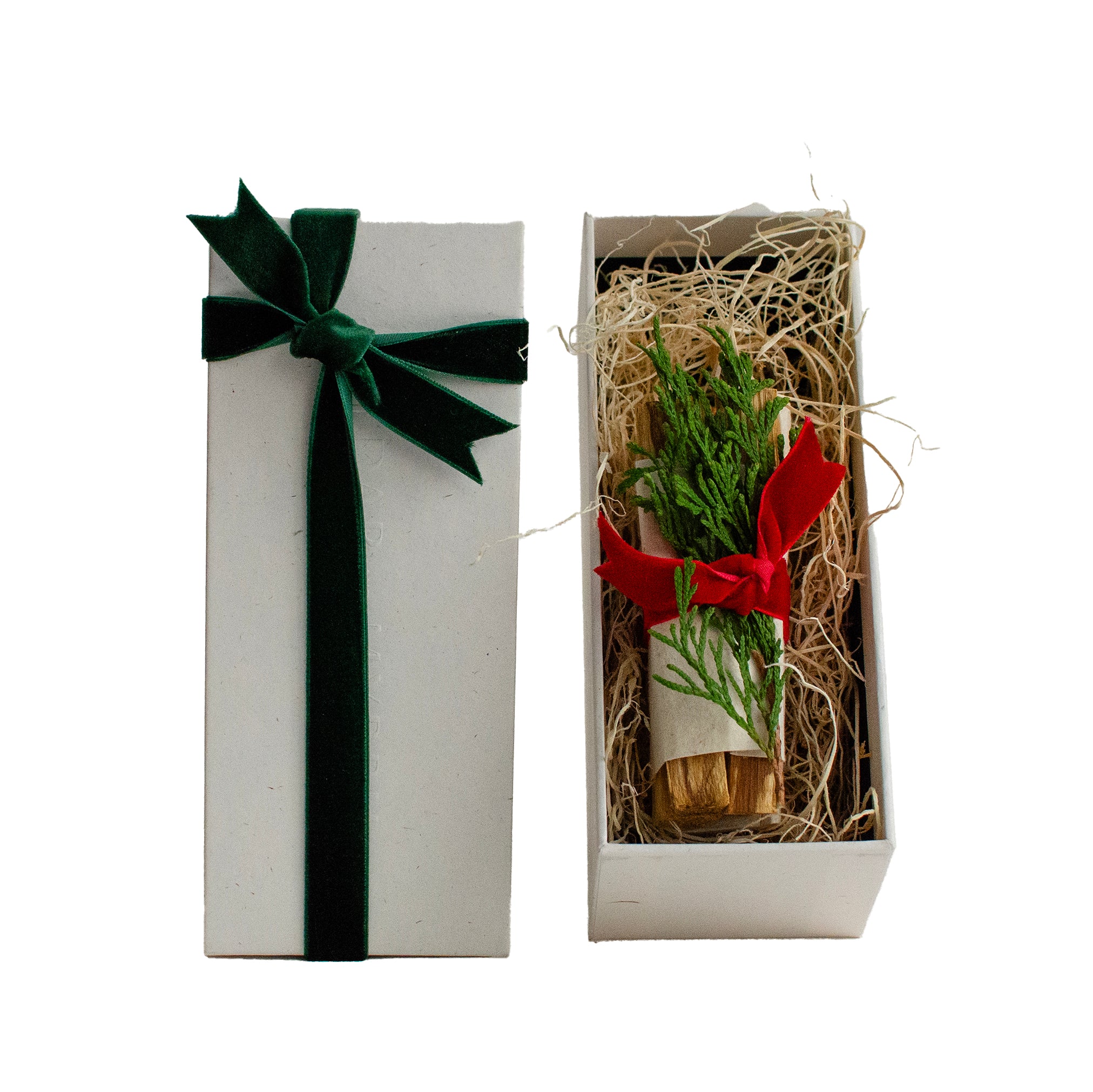 Palo Santo housewarming gift set in white box with green velvet ribbon and hand-tied greenery with red bow — Cedar & Myrrh Warm Welcome Set1