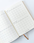 page of monthly plan on wellness journal